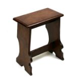 A mahogany stool, 41cms (16ins) wide.