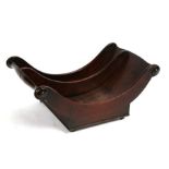 A George III mahogany two-division cheese coaster with original miniature brass castors, 43cms (