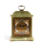 An Elliot green onyx cased mantle clock with silvered dial and Roman numeral, 21cms (8.25ins) high.