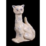 A continental faience pottery stylised cat, 19cms (7.5ins) high.