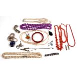 A quantity of costume jewellery to include stick coral necklaces, a Siam silver bracelet and a
