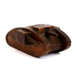 A WW1 trench art Tank money box made entirely of wood with moving machine guns and cannon. The