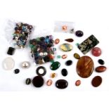 A quantity of loose gem stones and agates to include a few tiny diamonds.