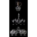 A continental cut glass claret jug with silver plated mounts; together with a cut glass decanter,