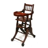 An Edwardian child's metamorphic high chair.