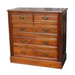 A late 19th century walnut chest of two short and three long graduated drawers, on a plinth base,