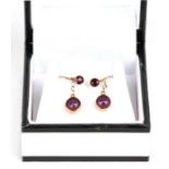 A pair of 9ct gold screw back drop earrings.