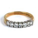 An 18ct gold seven-stone diamond ring, approx 0.5ct of diamond, approx UK size 'L'.