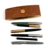 Four Parker fountain pens; together with a Parker propelling pencil (5).