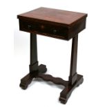 A 19th century rosewood work table, the fold-over top with inset leather above a single frieze