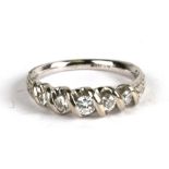 A 14ct white gold five-stone diamond ring, approx UK size 'L'.