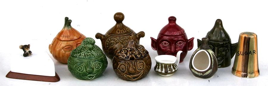 A group of vegetable face pots to include Sylvac and other items