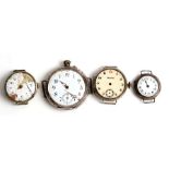 Four trench watches, the largest converted from a pocket watch.