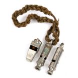 An Acme City whistle; together with an Acme Thunderer whistle and a Metropolitan whistle (3).