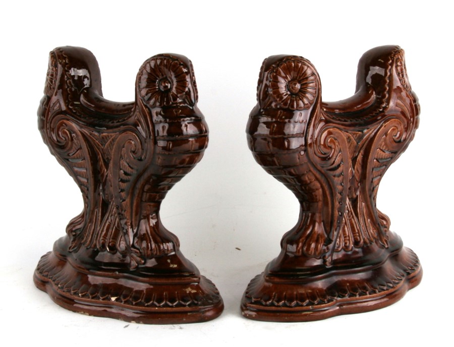 A pair of treacle glaze fire dogs in the form of owls, 24cms (9.5ins) high. - Image 2 of 2