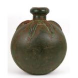 A decorative distressed green painted metal vase, 34cms (13.5ins) high.