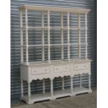 A modern white painted dresser. 180cm (71 ins) wide