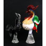 An Italian Murano glass rooster, 31cms (12.75ins) high; together with another similar smaller, 25cms