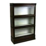 An oak three-tier Globe Wernicke bookcase, 87cms (34.25ins) wide.