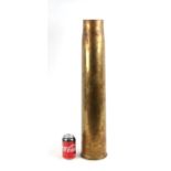 A huge WW2 brass shell case umbrella/stick stand. Marked to the base: 3.7" GUN. 1943. Diameter at
