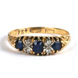 An 18ct gold diamond and sapphire ring, approx UK size 'Q', weight 3.4g,