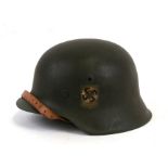 An M1942 Third Reich German helmet with Sauerland decal, lining and chin strap. Production number