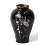 An Indian black enamelled brass vase with mother of pearl decoration, 14cms (5.5ins) high.