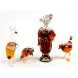 A group of four unopened novelty liqueur bottles, the largest 18cms (7.2ins).