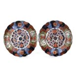 A pair of Japanese Imari chargers, 34cms (13.5ins) diameter (2).