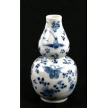 A Chinese blue & white double gourd vase decorated with birds, butterflies and flowers, four