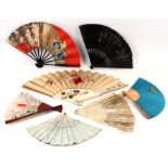 A group of fans to include a silk embroidered bone example (7).