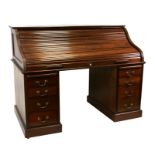 An early 20th century mahogany roll top pedestal desk, 153cms (60ins) wide.Condition Report Probably
