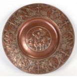 A 19th century Grand Tour style copper dish decorated with classical figures, 19cms (7.5ins) wide.