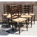 A set of six ladder back chairs with rush seats