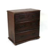 A late 19th century pine chest of three long drawers, 76cms (30ins) wide.