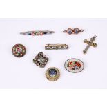A group of Italian micromosaic pendants and brooches.