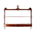 A Brights of Nettlebed three tier mahogany wall shelf the two frieze drawers. 92cm ( 36 ins) wide