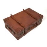 An early 20th century leather suitcase, 46cms (18ins) wide.