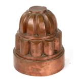 A 19th century three-tier copper jelly mould, numbered '168' and initialled 'MW', 21cms (8.25ins)