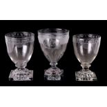 A 19th century etched glass initialled 'JHA' with lemon squeezer base, 15cms (6ins) high. together