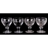 A set of four wine glasses with snapped off pontil mark, 17cms (6.75ins) high (4).Condition