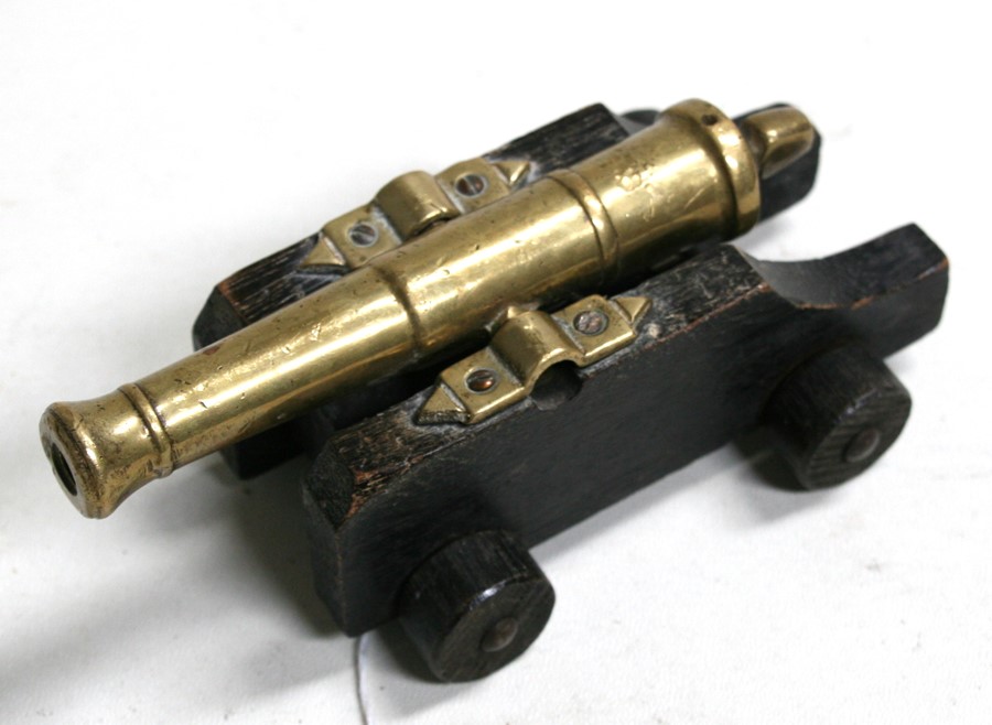 An early 20th century signal cannon with a brass or possibly bronze barrel mounted on a wooden - Image 3 of 5