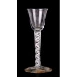 An 18th / 19th century air twist stem wine glass, 15cms (5ins) high.Condition Report Good