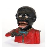 A cast iron money bank, 14cms (5.5ins) high.