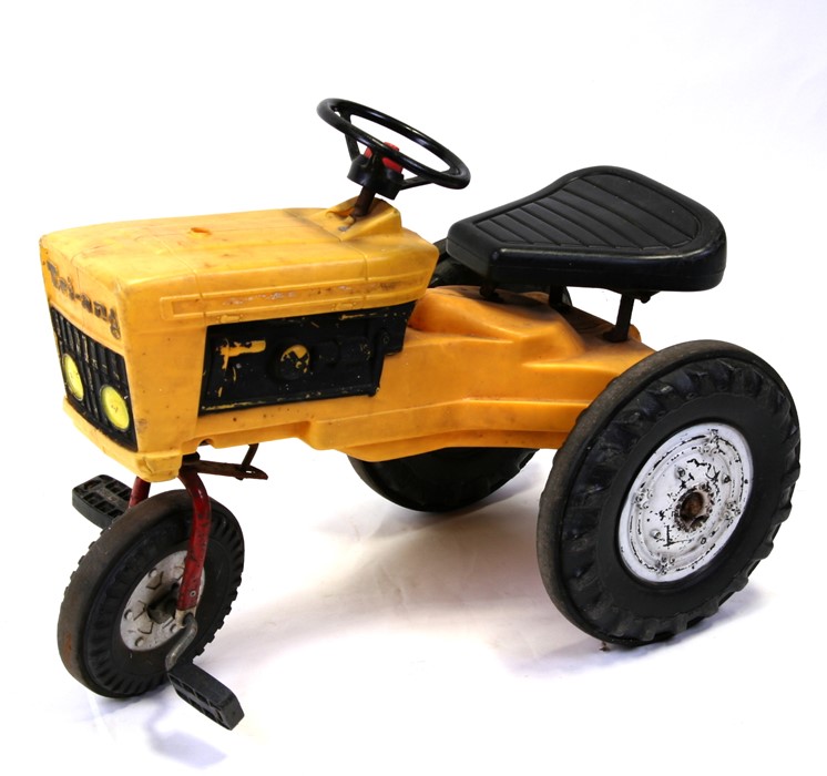 A vintage Tri-Ang child's ride on tractor