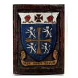 A painted oak panel carved with the heraldic arms of University College (Durham University),