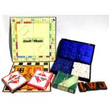 A group of vintage board games; together with a boxed soapstone chess set.
