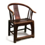 A Chinese horse shoe back chair.