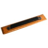 A military issue boxwood rolling ruler, 38cms (15ins) wide.