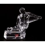A Swedish Orrefors glass figure of an ice hockey player, 11cms (4.75ins) high.